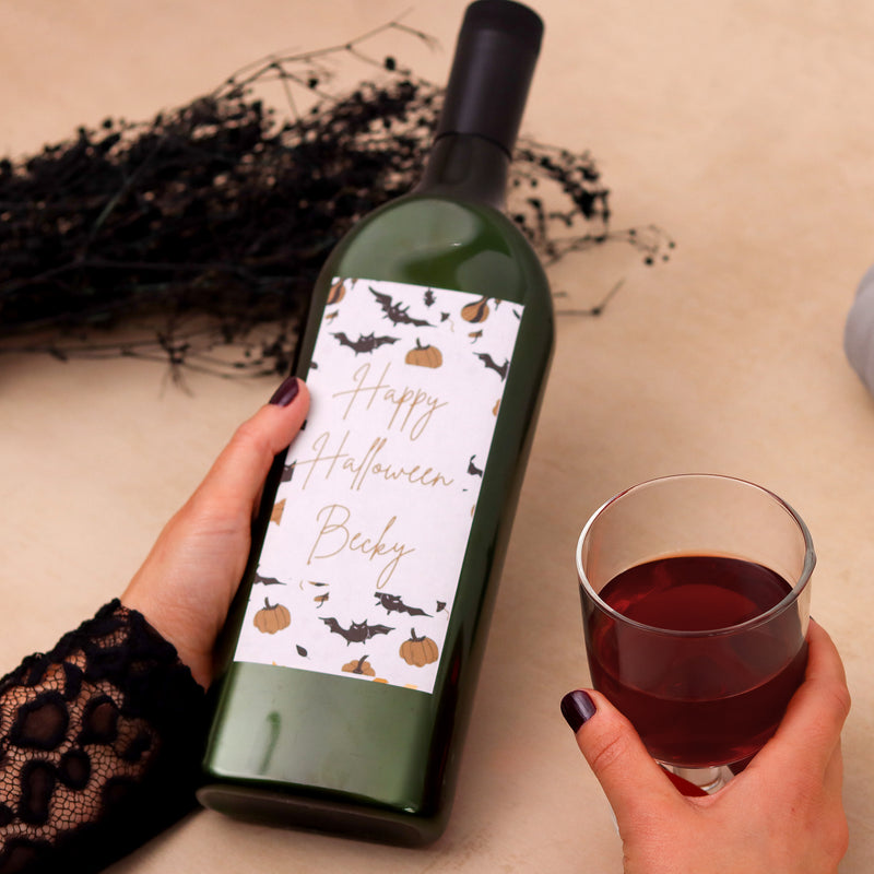 Letterbox wine bottle with personalised name on a happy halloween label with bat and pumpkin images