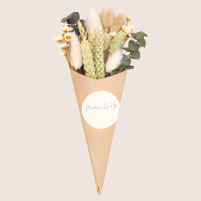 Neutral green & white dried flower posy with 'mum to be' sticker in a kraft cone