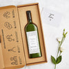 Letterbox-friendly wine bottle with personalised 'happy new home' wine label and new home greetings card