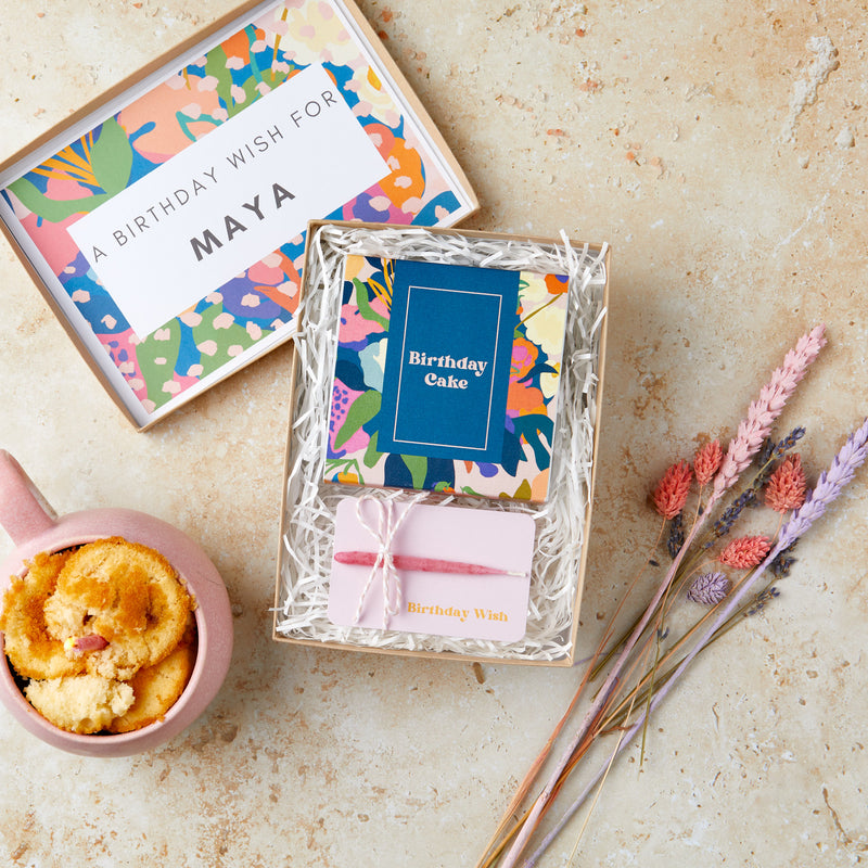 Mini birthday gift set containing birthday mug cake mix and birthday wish candle with personalised name on inside lid