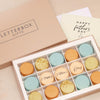 Orange, green and cream macarons in a letterbox-friendly gift box with a Happy Fathers day greetings card
