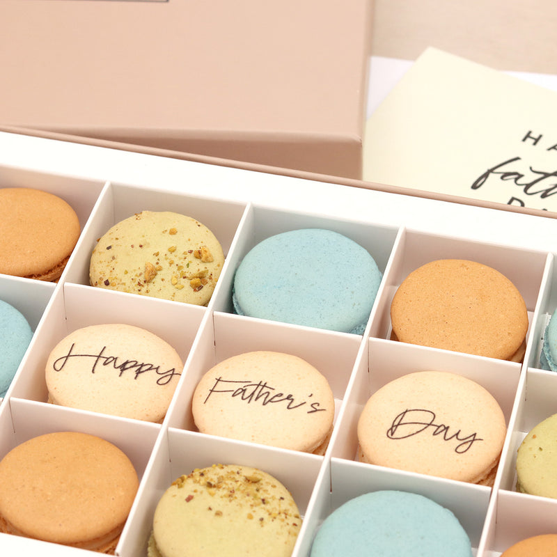 Fifteen Orange, green and cream macarons in a letterbox-friendly gift box with a Happy Fathers day greetings card