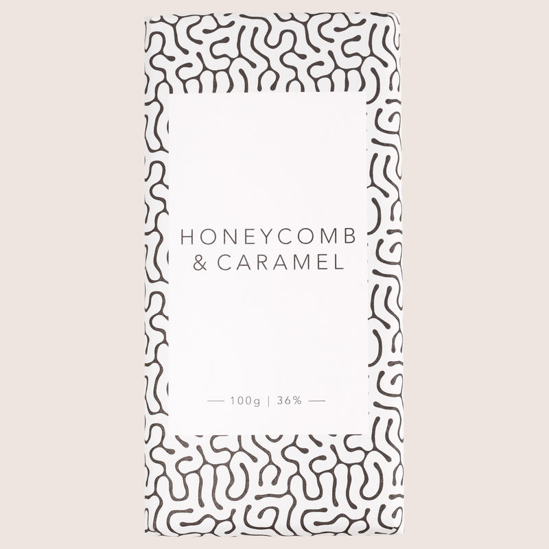 Honeycomb & caramel milk chocolate bar in black and white monochrome design