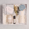 Luxury mama to be gift set containing baby is brewing raspberry leaf tea, mama to be candle, lavender & chamomile aromatherapy pulse point essential oil roll on, for the bump chocolate truffles, bloom bath soak & natural dried flower sprig, in a white gift box with shredded straw
