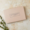 Tan brown gift box with 'letterbox gifts' text on the lid