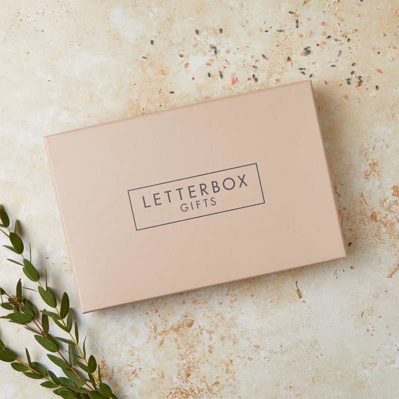 Tan brown gift box with 'letterbox gifts' text on the lid