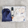 Perfect night's sleep gift set containing dark blue silk eye mask, sleep better pulse point roll on, lavender pouch, calm balm & tealights