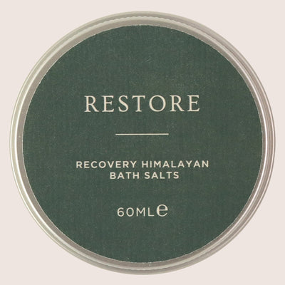 'Restore' rosemary & clary sage bath salts in 60ml tin with dark green sticker