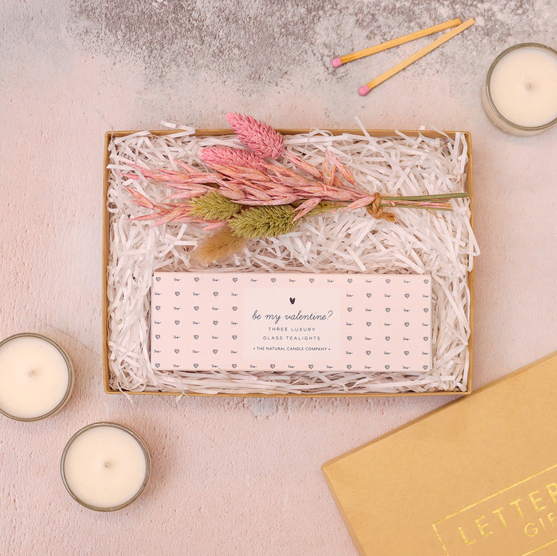Valentine's mini gift set containing 'be my valentine?' tealights & pastel pink dried flower posy in a kraft box