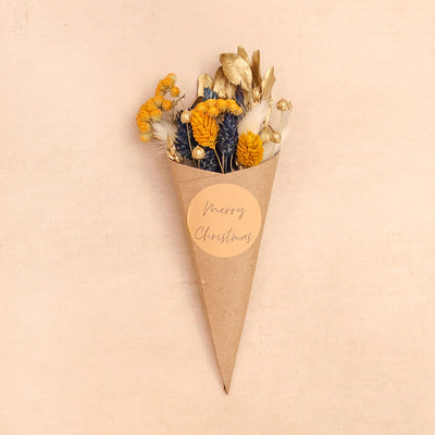 Gold, yellow & blue dried flower posy in kraft cone with 'merry christmas' sticker