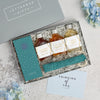 Letterbox 'Cocktail' Gift set containing three gin miniatures, chocolate bar and bamboo straw with 'Thinking of you' Greetings card