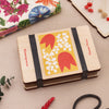 Wooden flower press gift set with yellow, red and white floral design