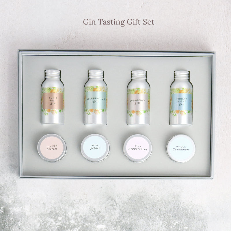 The 'Gin Tasting' gift set containing four different 'gin in a tin's and four botanical tins