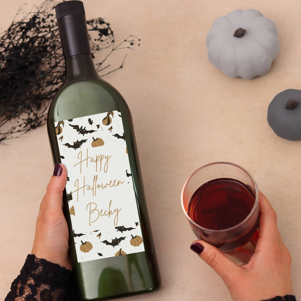 Letterbox wine bottle with personalised name on a happy halloween label with bat and pumpkin images