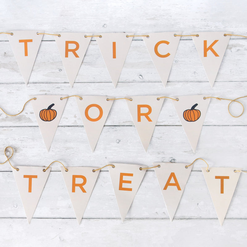 Trick or treat halloween bunting triangles in orange and white