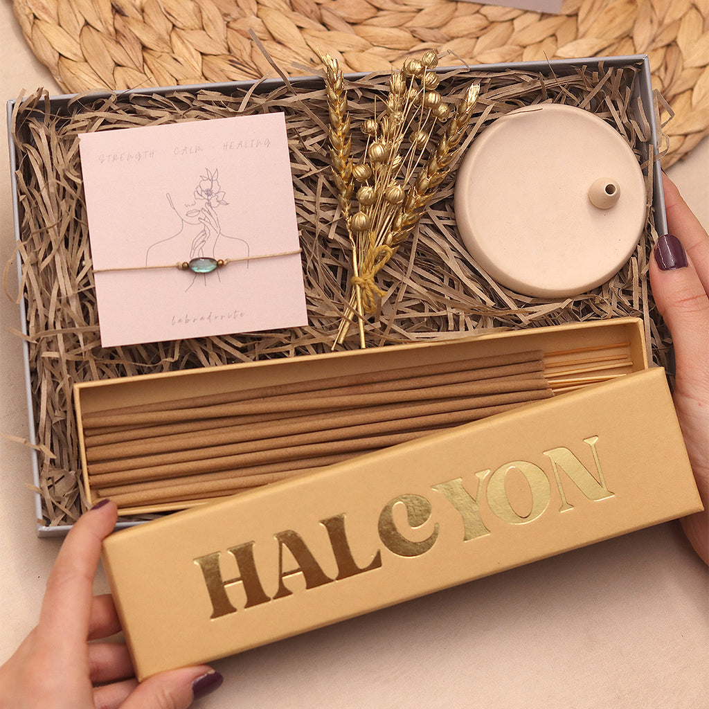 Mindful moments letterbox gift set containing Halcyon incense sticks, stone incense holder, labradorite gemstone bracelet & mini gold dried flower posy