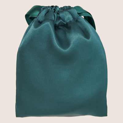 Green silk eye mask in matching green silk pouch