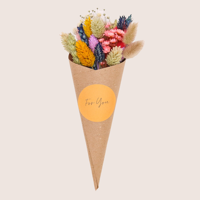 Bright yellow, blue, purple & pink dried flower posy in kraft cone with yellow 'for you' sticker