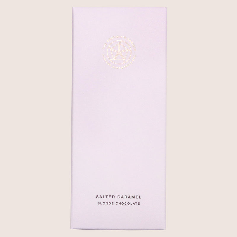 Salted caramel blonde chocolate bar in pale purple cardboard box
