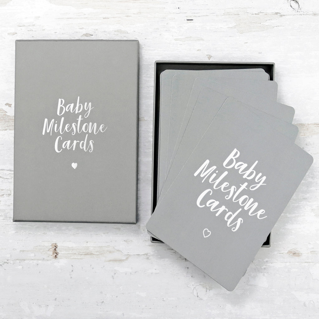 Grey baby milestone card set in a grey gift box