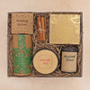 Luxury christmas hamper containing hot chocolate flakes, winter tea, mulled pear candle, butterscotch truffles & cinnamon bundle