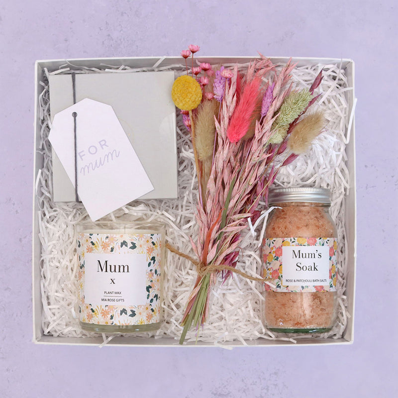 Mum's luxury gift hamper containing 'mum's soak' bath salts, mum candle, butterscotch truffles & pastel dried flower bouquet