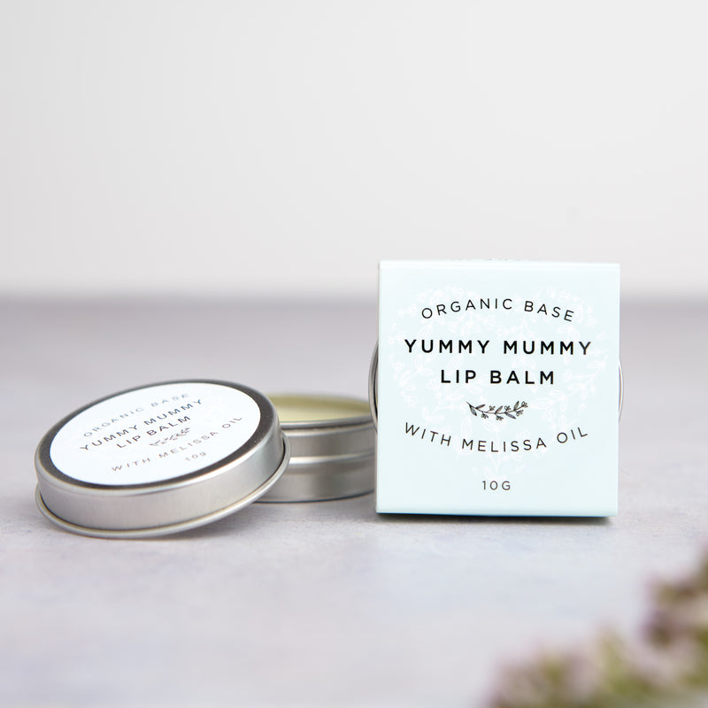 Organic Lip balm tin with blue 'yummy mummy lip balm' sleeve