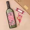 Letterbox-friendly wine bottle with 'Happy Mother's Day' label, sweet orange caramel chocolate bar & mini pink dried flower posy