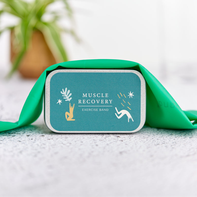 Muscle recovery green latex exercise band in metal tin