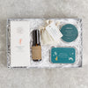 Muscle relaxation letterbox-friendly gift set containing workout fuel chocolate bar, muscle rub, shower steamer, bath sallts and muscle recovery band