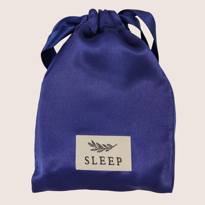 Blue silk eye mask in a blue silk bag with sleep label