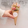 Valentine's day pink and neutral dried flower posy with love heart and 'love'  sticker in a kraft cone