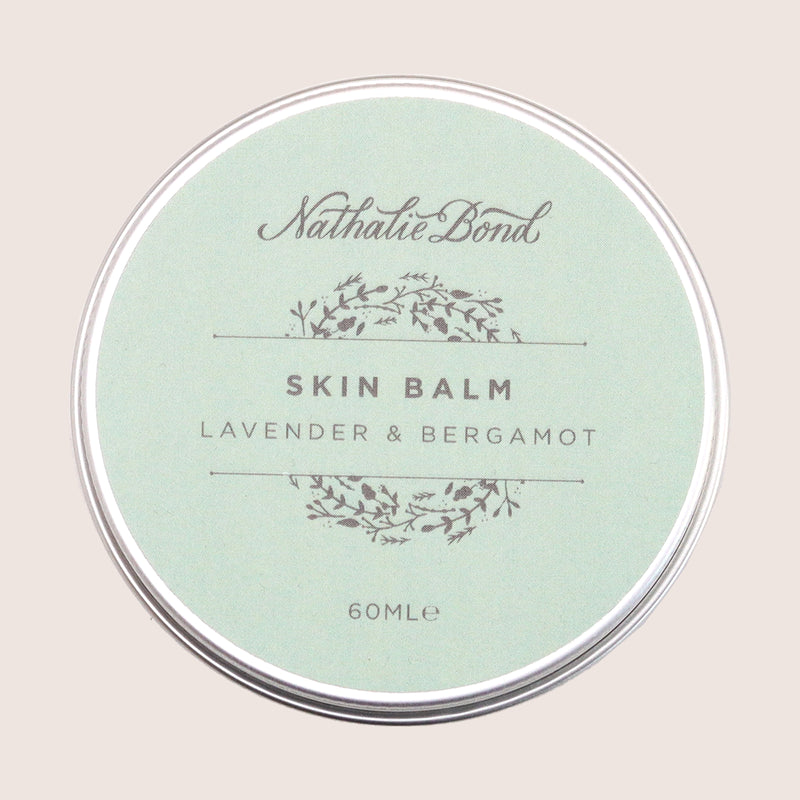 Lavender & bergamot skin balm with pale green label in a 60ml tin