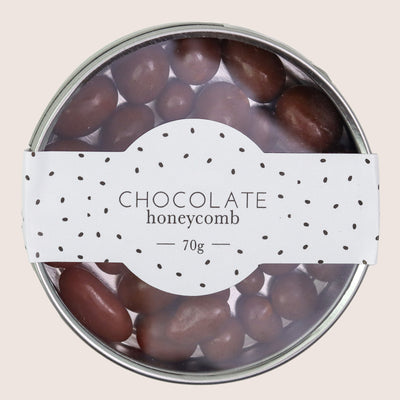 Chocolate honeycomb bites in a 70g tin with spotty black and white label