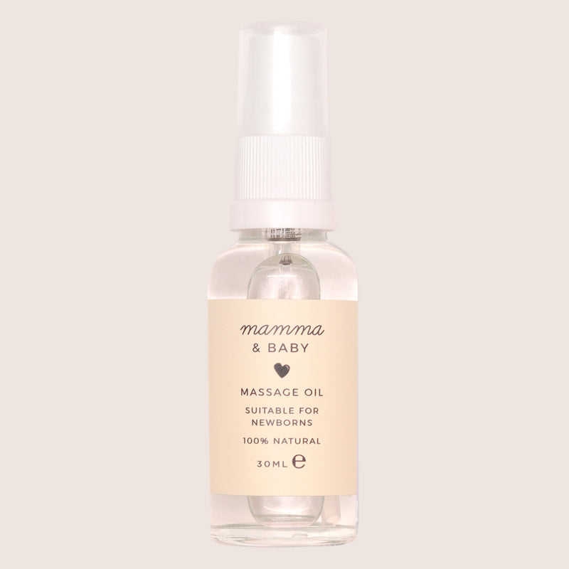 Mamma & baby massage oil in 30ml glass bottle with yellow label and spray nozzle