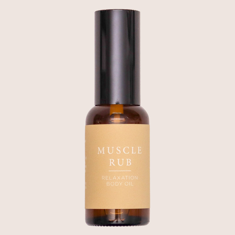 Muscle rub body oil in brown glass bottle with spray nozzle