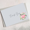a light blue, A6 Thank You greetings card with pink roses and grey envelope