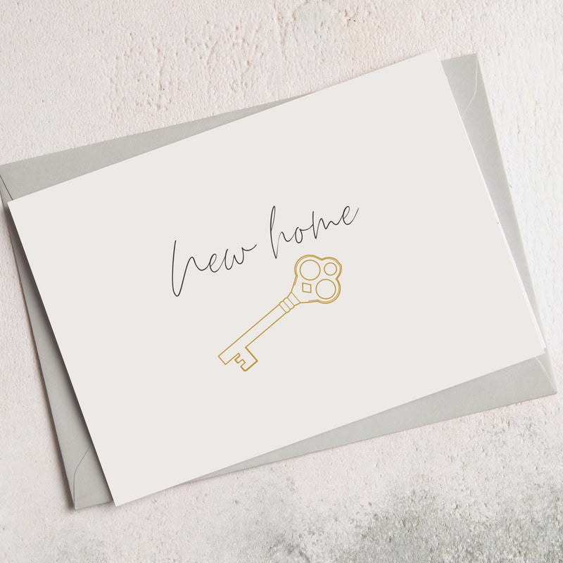 New home greetings card with gold key image