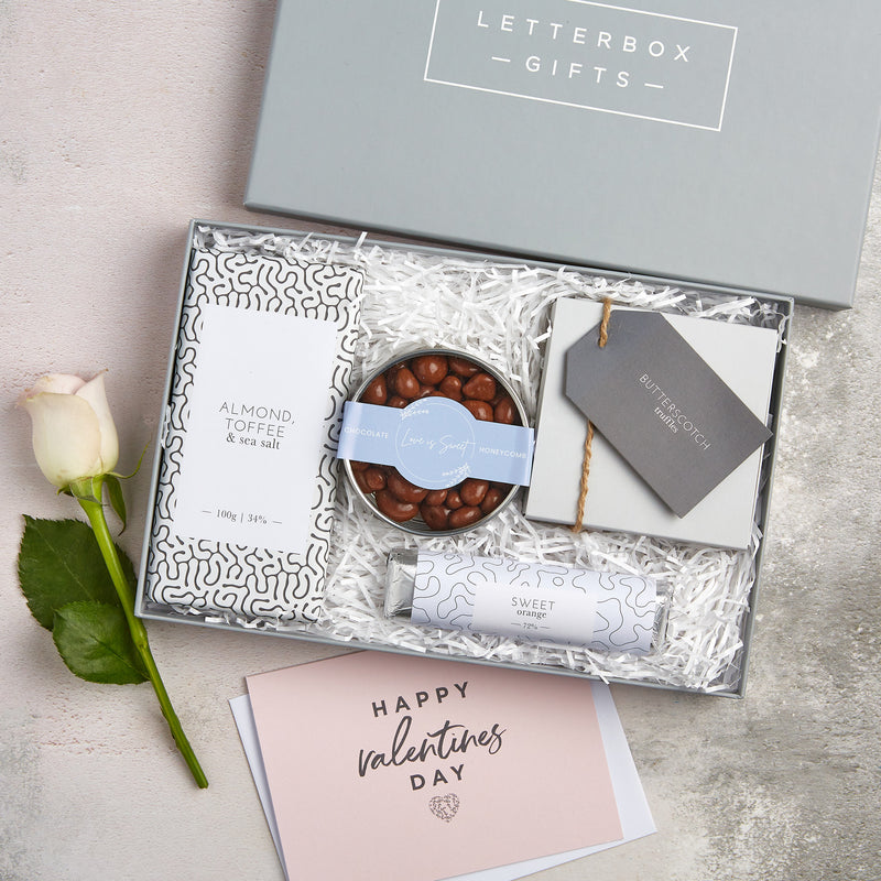 Valentine Chocolate letterbox gift set containing 'Love is Sweet' chocolate honeycomb, butterscotch truffles, almond & toffee chocolate bar & sweet orange bar